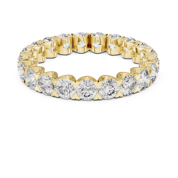 Yellow gold round cut diamond eternity ring with full shared prong setting, lab grown diamond wedding band, luxury bridal jewelry.