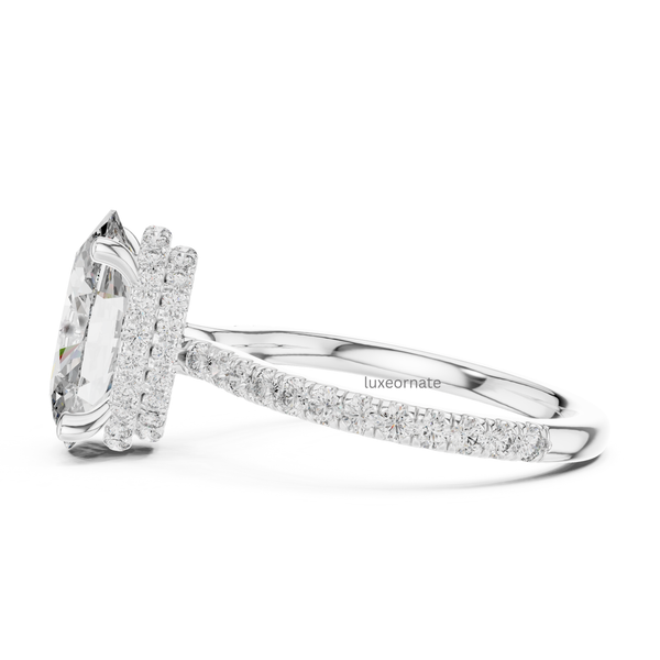 Side profile white gold oval diamond halo engagement ring with layered halo detail.