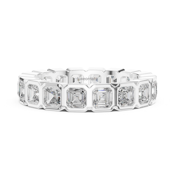 Close up white gold Asscher cut diamond bezel set eternity ring, square step cut bridal band