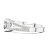 Side profile white gold cushion cut diamond engagement ring with cathedral style split band.