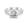Front view white gold cushion cut diamond ring with double pavé split shank.