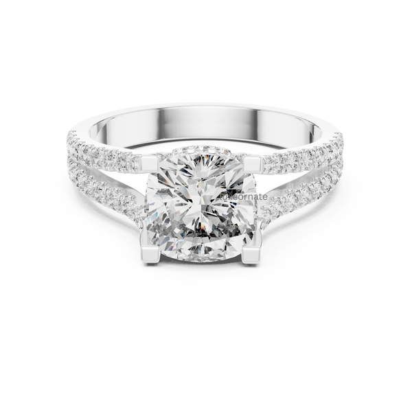 Front view white gold cushion cut diamond ring with double pavé split shank.
