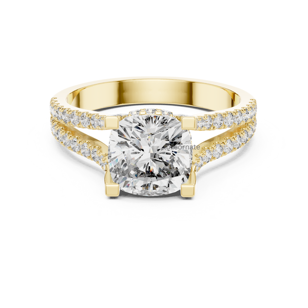 Front view yellow gold cushion cut diamond engagement ring with split shank pavé band.