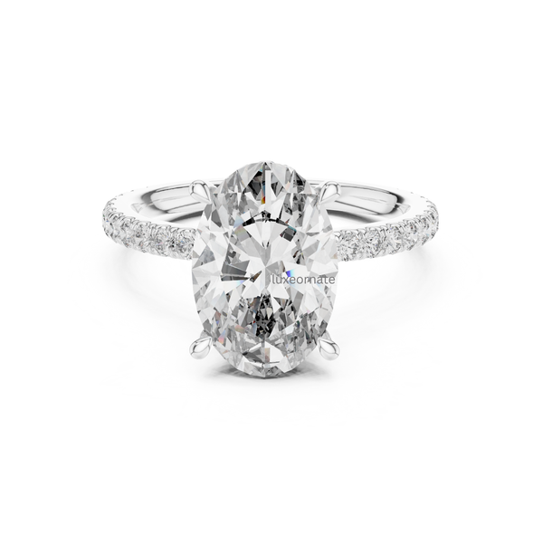 Front view white gold oval diamond halo engagement ring with pavé band.