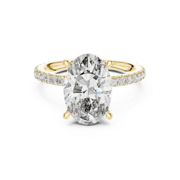Front view yellow gold oval cut diamond halo ring with pavé set diamond band.