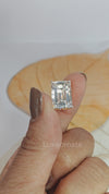 Emerald cut diamond pendant in yellow gold