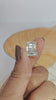 Emerald cut diamond pendant in yellow gold
