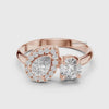 Modern toi et moi diamond ring with halo pear and round brilliant stones